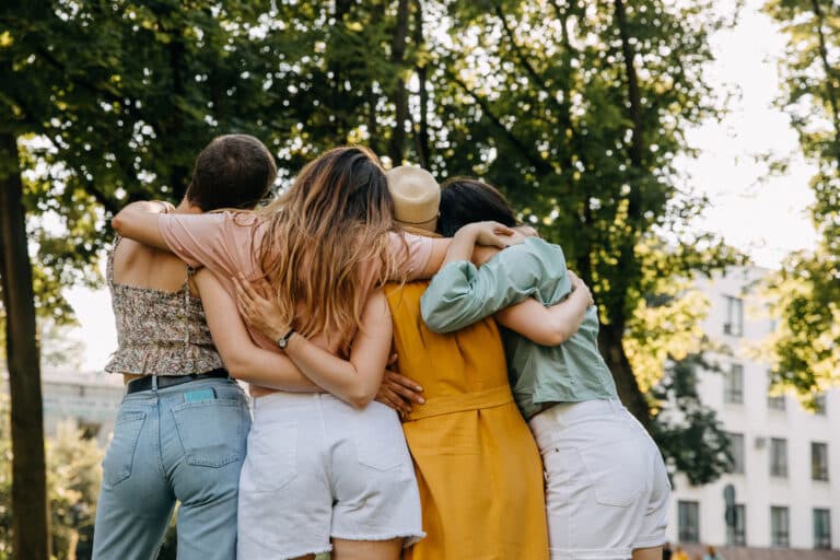 Women Arms Around Each Other